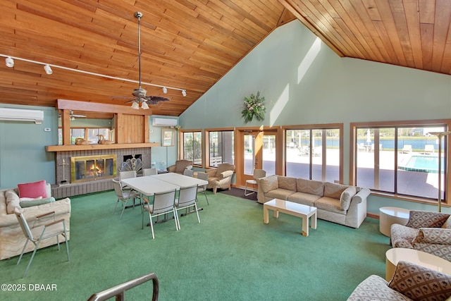 living room featuring high vaulted ceiling, a fireplace, carpet, wooden ceiling, and a wall unit AC