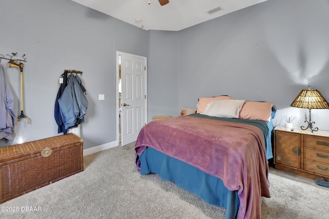 bedroom with light colored carpet and ceiling fan