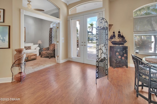 foyer entrance featuring light wood-type flooring and french doors