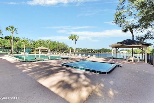 view of swimming pool with a gazebo and a patio area