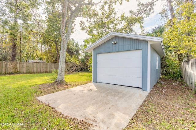 garage with a lawn