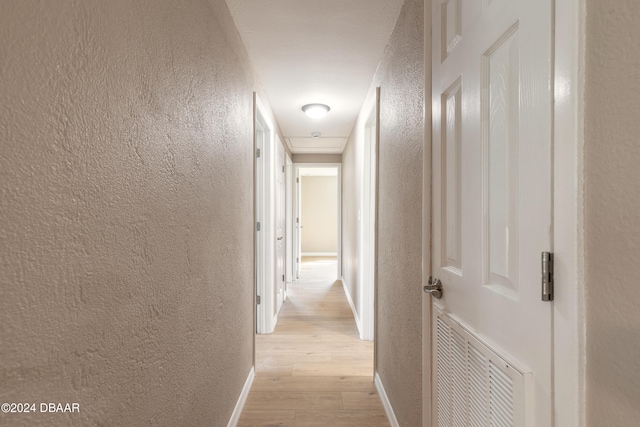 hall featuring light wood-type flooring