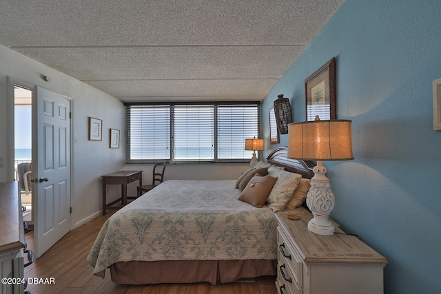 bedroom featuring hardwood / wood-style floors