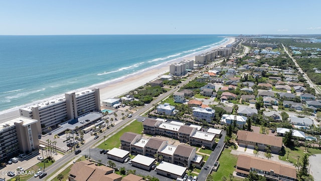 bird's eye view with a view of the beach and a water view