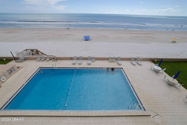 4435 S Atlantic Ave Unit 414, Ponce Inlet, FL 32127 - community pool with view of water and beach and a patio