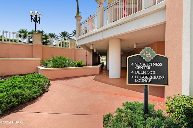 view of patio featuring a balcony