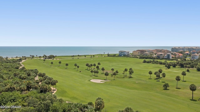 aerial view featuring view of golf course and a water view