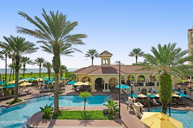 view of swimming pool featuring a patio area