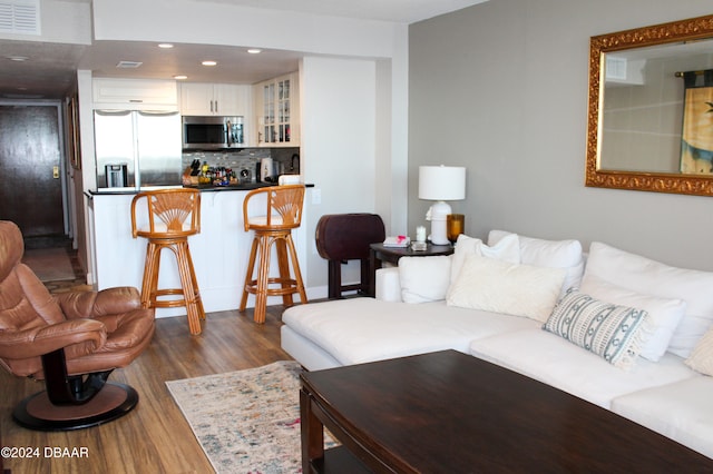 living room featuring dark hardwood / wood-style floors