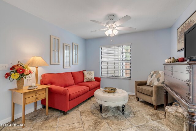 living room featuring ceiling fan