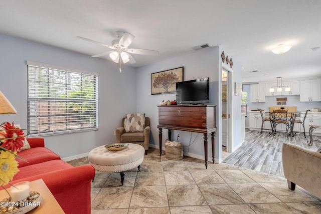 living room with ceiling fan