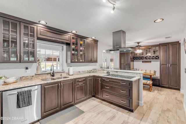 kitchen with island range hood, sink, stainless steel dishwasher, light stone counters, and black electric cooktop