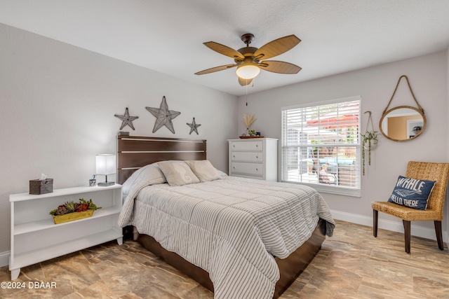 bedroom featuring ceiling fan