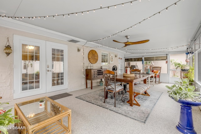 dining area featuring french doors and ceiling fan