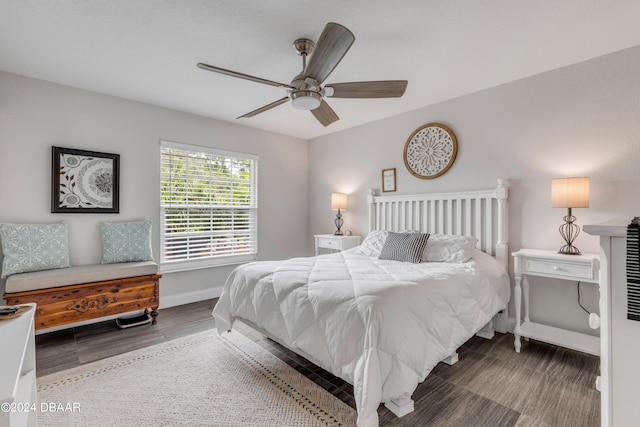 bedroom featuring dark wood-type flooring and ceiling fan