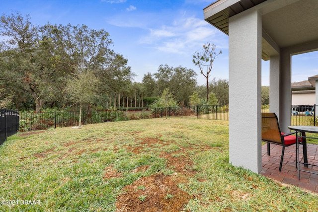 118 Pitching Wedge Dr, Daytona Beach, FL 32124 - fenced backyard with a patio