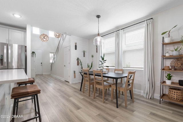 118 Pitching Wedge Dr, Daytona Beach, FL 32124 - dining space featuring light wood-style flooring and baseboards