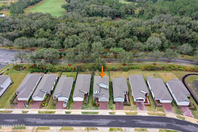 118 Pitching Wedge Dr, Daytona Beach, FL 32124 - aerial view of property's location with nearby suburban area and a heavily wooded area