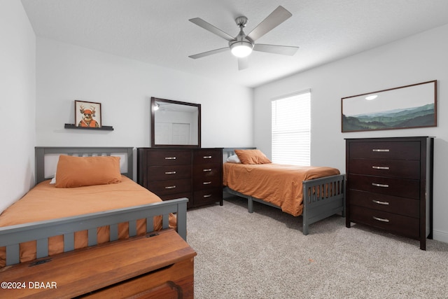 118 Pitching Wedge Dr, Daytona Beach, FL 32124 - bedroom with light carpet and a ceiling fan