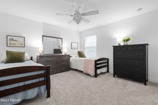 118 Pitching Wedge Dr, Daytona Beach, FL 32124 - bedroom featuring light carpet and ceiling fan