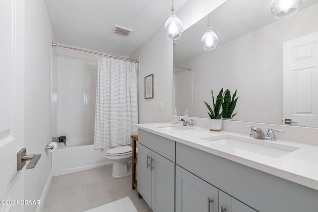 full bathroom with tile patterned floors, vanity, shower / bath combo, and toilet