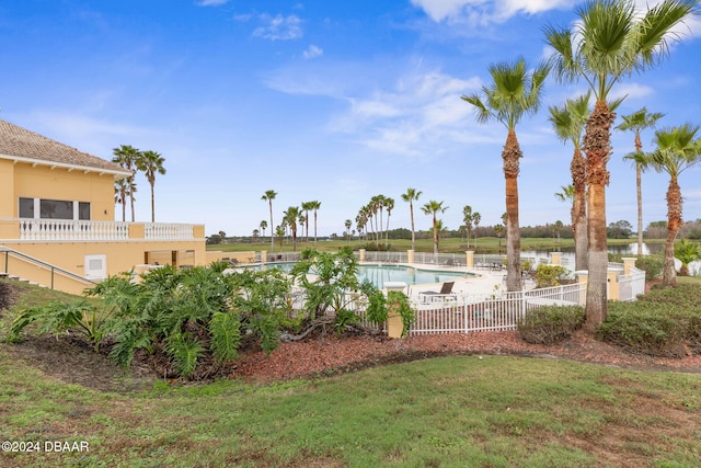 118 Pitching Wedge Dr, Daytona Beach, FL 32124 - view of yard featuring a community pool and a water view