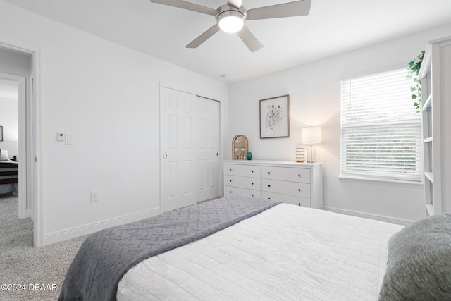 118 Pitching Wedge Dr, Daytona Beach, FL 32124 - bedroom featuring carpet, a closet, and a ceiling fan