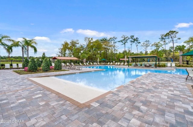 330 Charles Dr, Deland, FL 32724 - community pool featuring a patio area