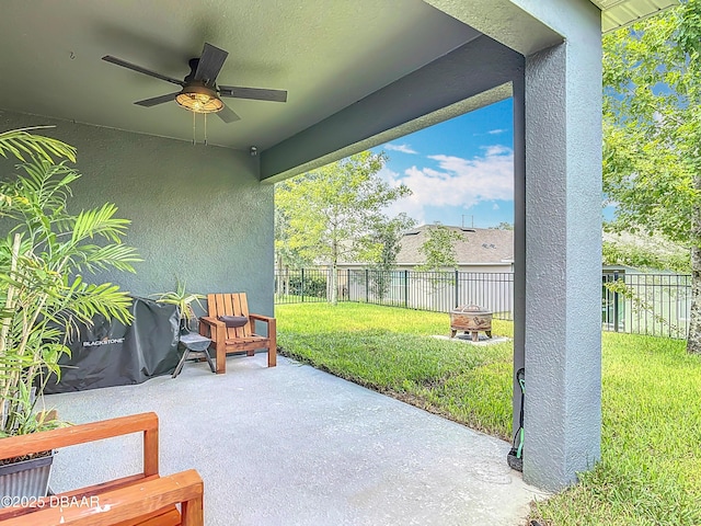 330 Charles Dr, Deland, FL 32724 - view of patio featuring a ceiling fan and a fire pit
