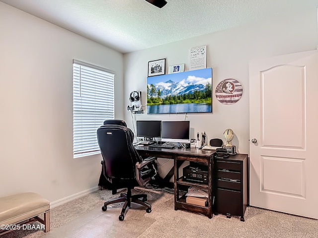 330 Charles Dr, Deland, FL 32724 - office area with light carpet, a textured ceiling, and baseboards
