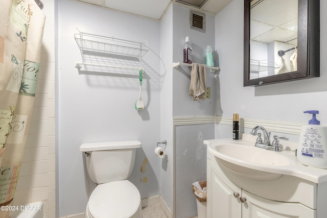 full bathroom featuring vanity, toilet, and shower / bathtub combination with curtain