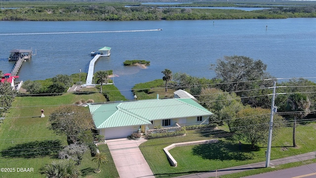 birds eye view of property featuring a water view