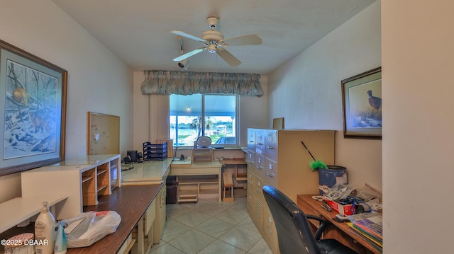 tiled office featuring ceiling fan