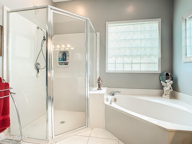 bathroom with plus walk in shower and tile patterned floors