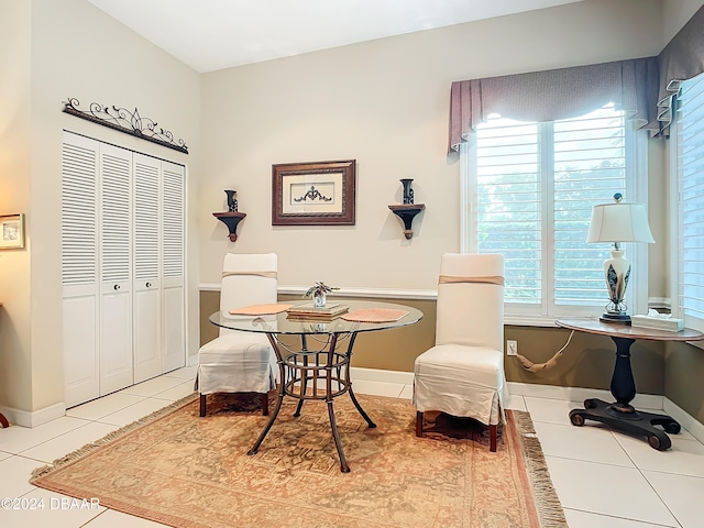 sitting room featuring tile patterned flooring