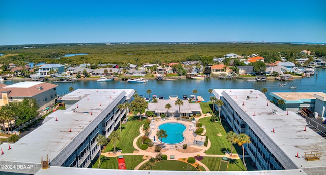 birds eye view of property featuring a water view