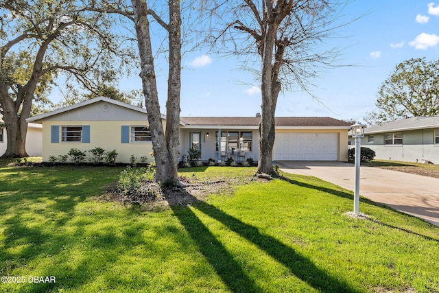 single story home with a garage and a front yard