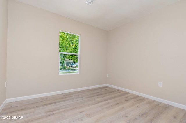 1808 Green Pl, Ormond Beach, FL 32174 - spare room featuring light wood-style floors and baseboards