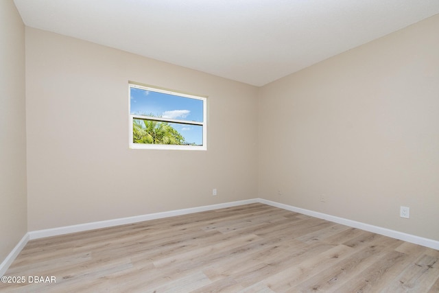 1808 Green Pl, Ormond Beach, FL 32174 - spare room featuring light wood-style flooring and baseboards