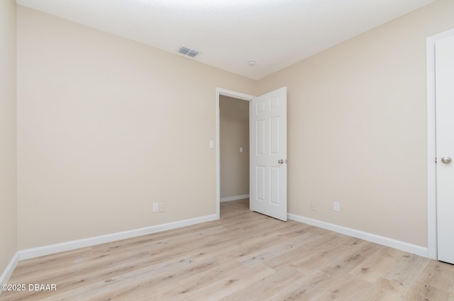 1808 Green Pl, Ormond Beach, FL 32174 - empty room with wood finished floors and baseboards