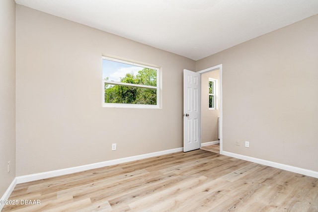 1808 Green Pl, Ormond Beach, FL 32174 - empty room featuring light wood-type flooring and baseboards