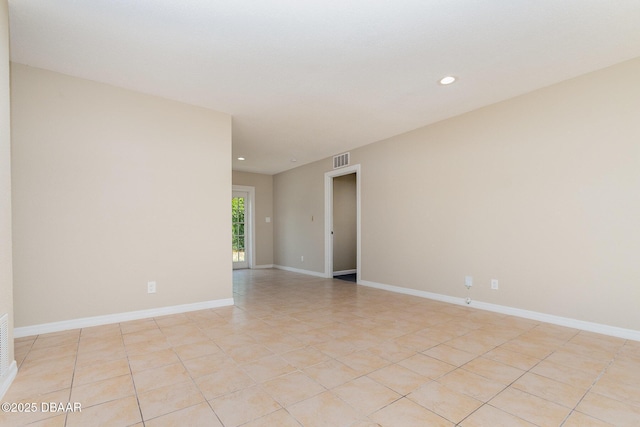 1808 Green Pl, Ormond Beach, FL 32174 - empty room featuring recessed lighting, baseboards, and light tile patterned floors