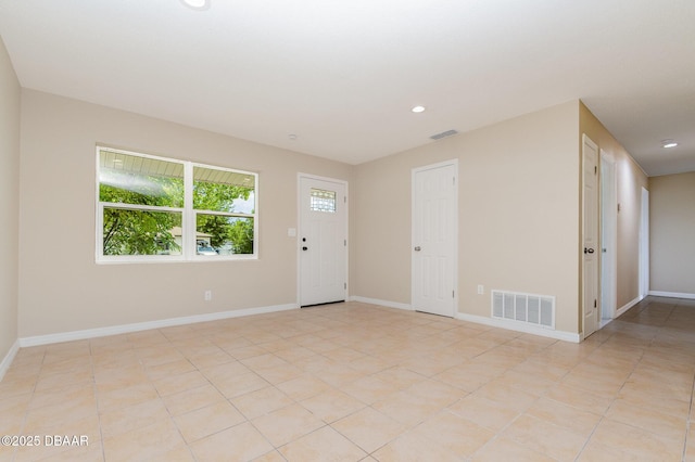 1808 Green Pl, Ormond Beach, FL 32174 - foyer entrance featuring baseboards, recessed lighting, and light tile patterned floors