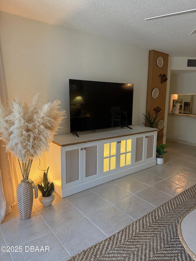 1415 Ocean Shore Blvd Unit 907, Ormond Beach, FL 32176 - details with a textured ceiling and visible vents