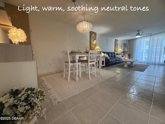 1415 Ocean Shore Blvd Unit 907, Ormond Beach, FL 32176 - dining room featuring ceiling fan with notable chandelier