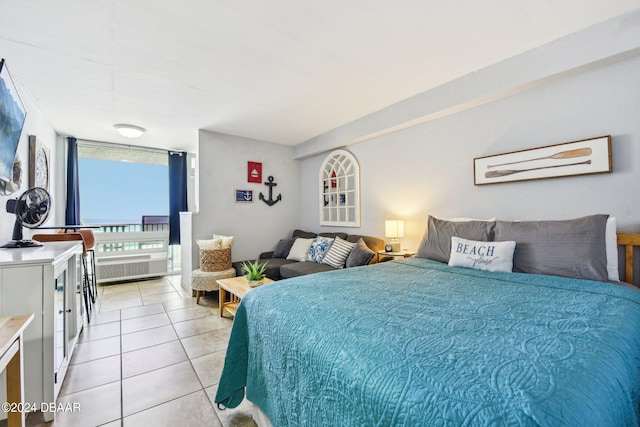 bedroom with light tile patterned flooring