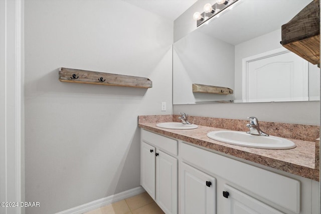 bathroom with tile patterned flooring and vanity