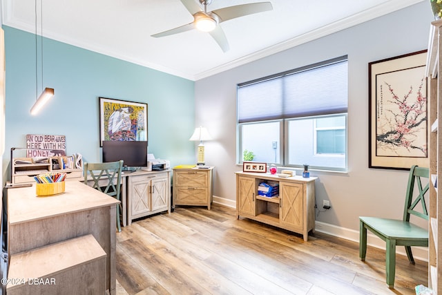 office area with crown molding, ceiling fan, and light hardwood / wood-style floors