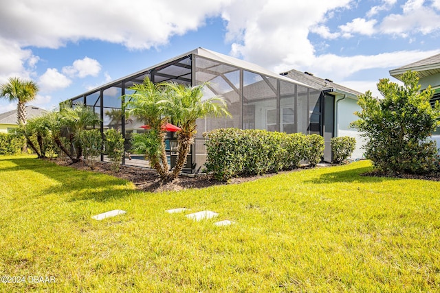 view of property exterior featuring a lanai and a lawn