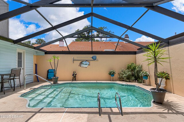 129 Sand Fiddler Ct, Daytona Beach, FL 32119 - swimming pool with a patio area and a lanai